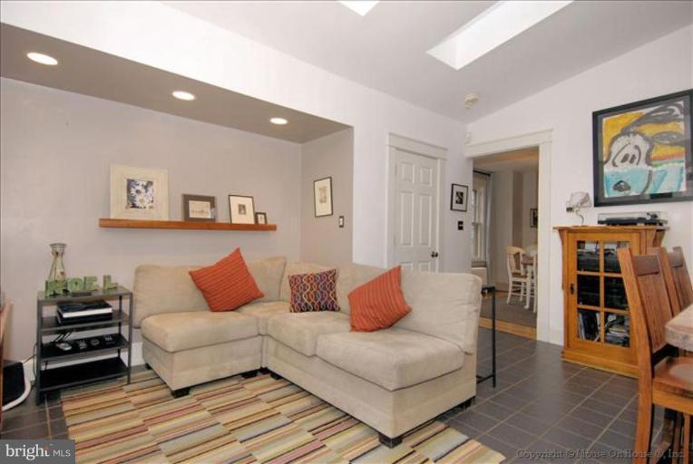 26 West Braddock Road Alexandria, VA 22301 - Photo 7 of 30 a living room with furniture and a couch