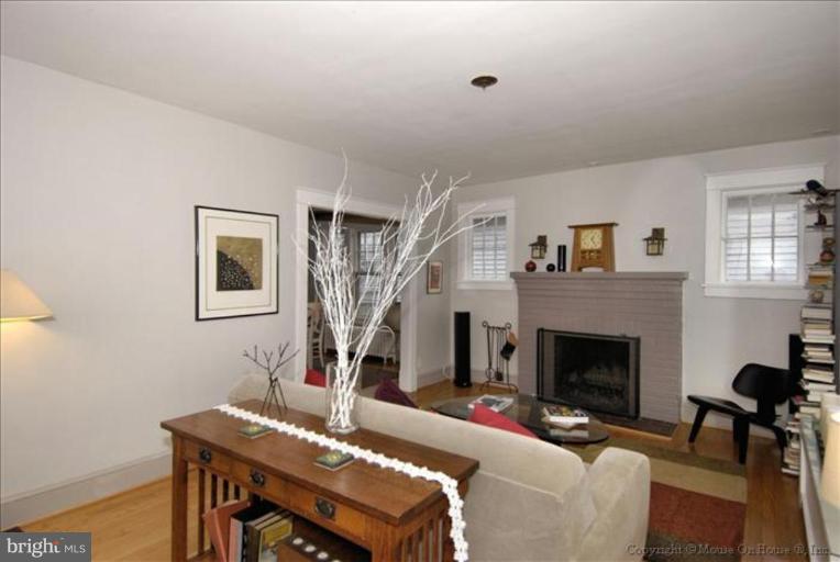 26 West Braddock Road Alexandria, VA 22301 - Photo 9 of 30 a living room with furniture a window and a fireplace