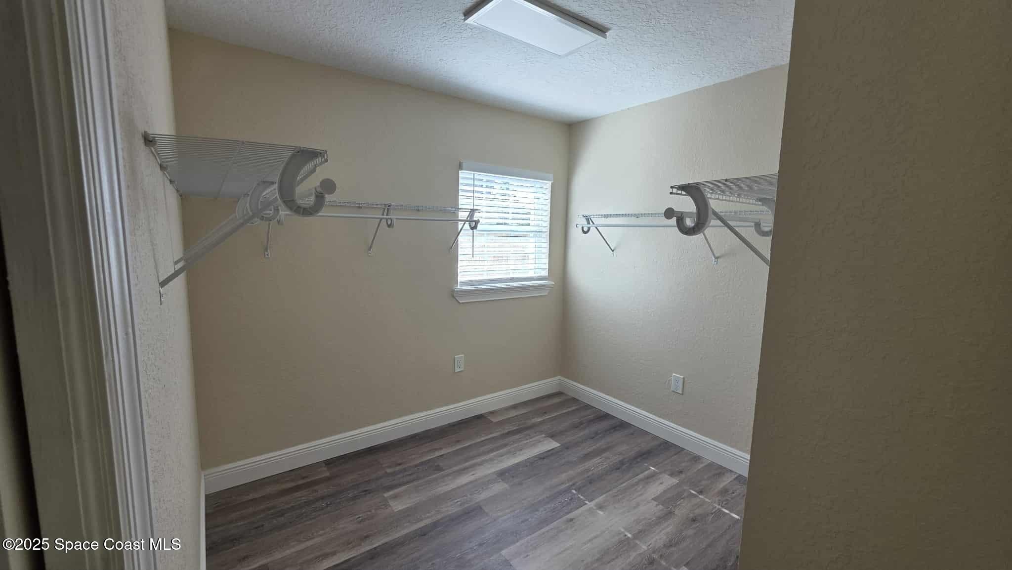 410 4th Street Merritt Island, FL 32953 - Photo 20 of 37 a view of an empty room with a window