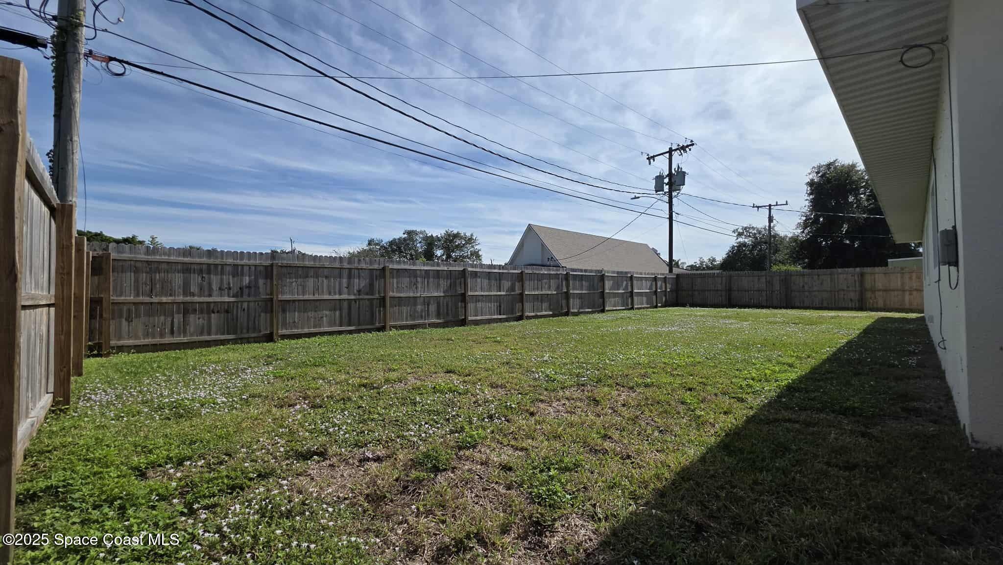 410 4th Street Merritt Island, FL 32953 - Photo 33 of 37 a view of a garden