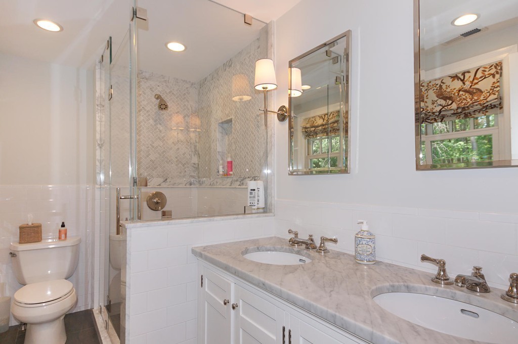 8 Tamarack Road Weston, MA 02493 - Photo 11 of 23 a bathroom with a granite countertop sink toilet and shower