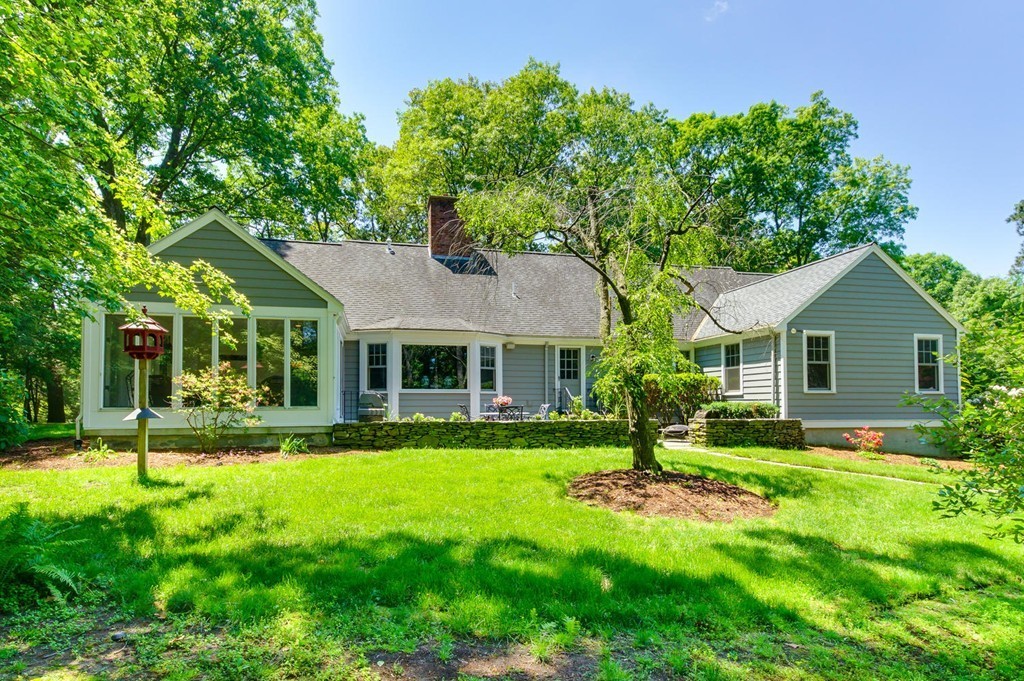 8 Tamarack Road Weston, MA 02493 - Photo 2 of 23 a porch with yard and green space
