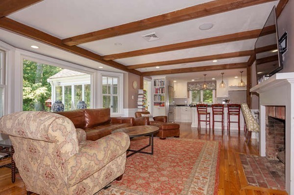 8 Tamarack Road Weston, MA 02493 - Photo 8 of 23 a living room with furniture and a large window