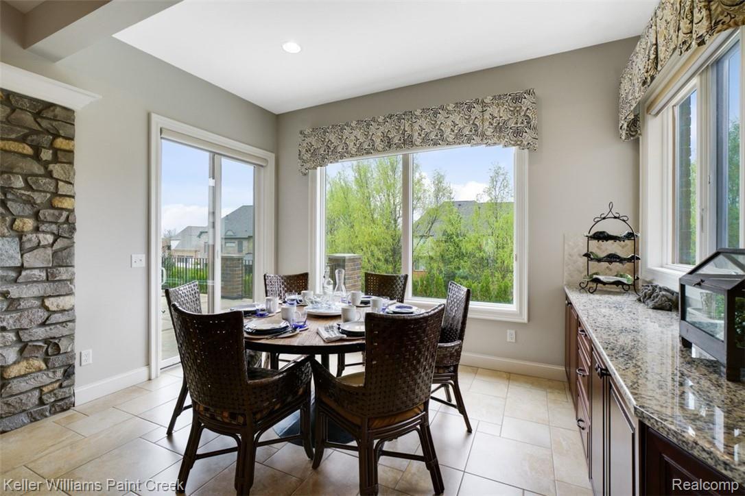 2888 North Addison Circle Rochester, MI 48306 - Photo 35 of 73 Enjoy your morning coffee in the Breakfast Area or on the spacious outdoor patio overlooking the pool.