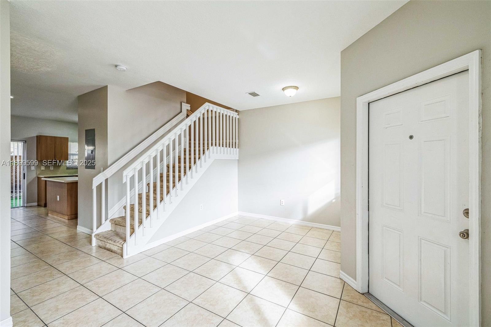 1655 Southeast 30th Street Homestead, FL 33035 - Photo 17 of 17 a view of an entryway with wooden floor
