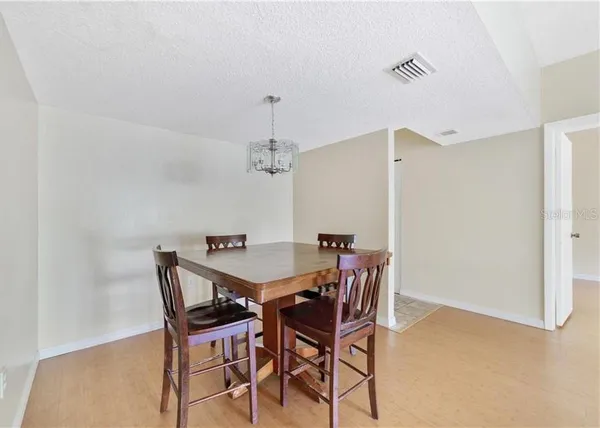 a view of a dining room with furniture