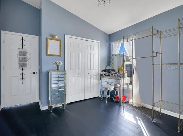 a view of livingroom with furniture and wooden floor
