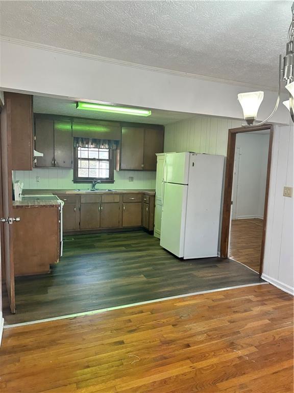 108 Rips Road Calhoun, GA 30701 - Photo 6 of 14 a room with a washing machine and cabinets