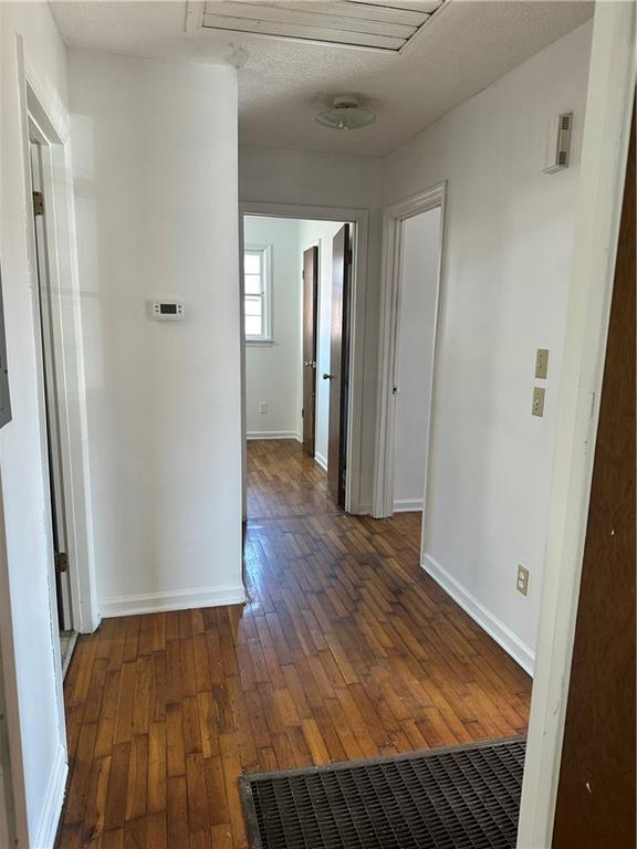 108 Rips Road Calhoun, GA 30701 - Photo 7 of 14 a view of a hallway with wooden floor
