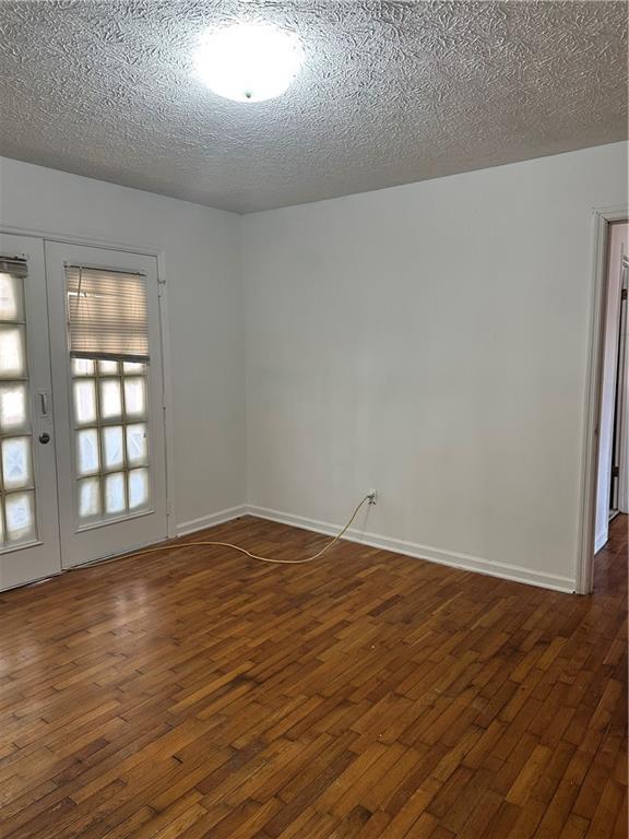 108 Rips Road Calhoun, GA 30701 - Photo 8 of 14 wooden floor in an empty room with a window
