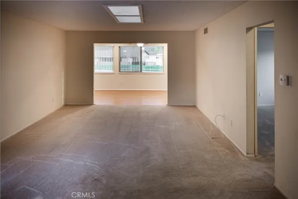 an empty room with windows