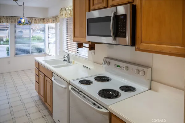 a utility room with washer and dryer