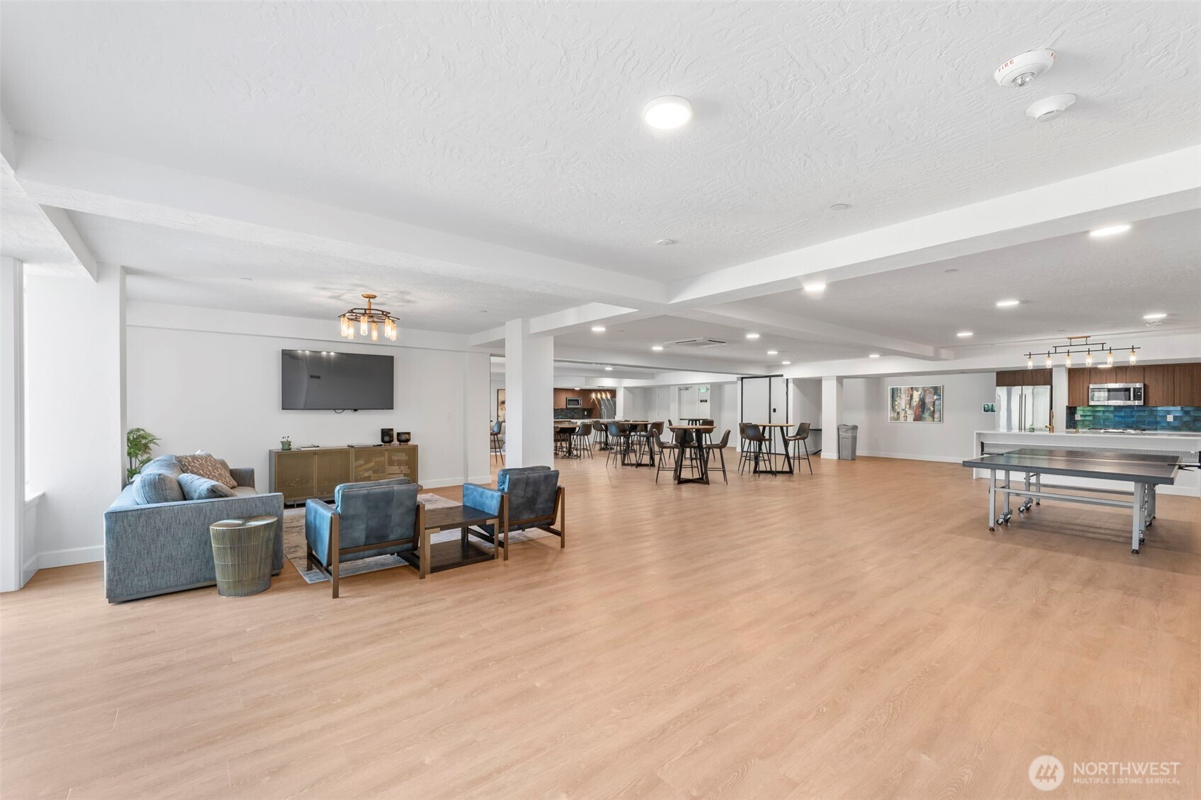 4907 Main Street, Unit 625 Tacoma, WA 98407 - Photo 31 of 40 a living room with furniture and a table