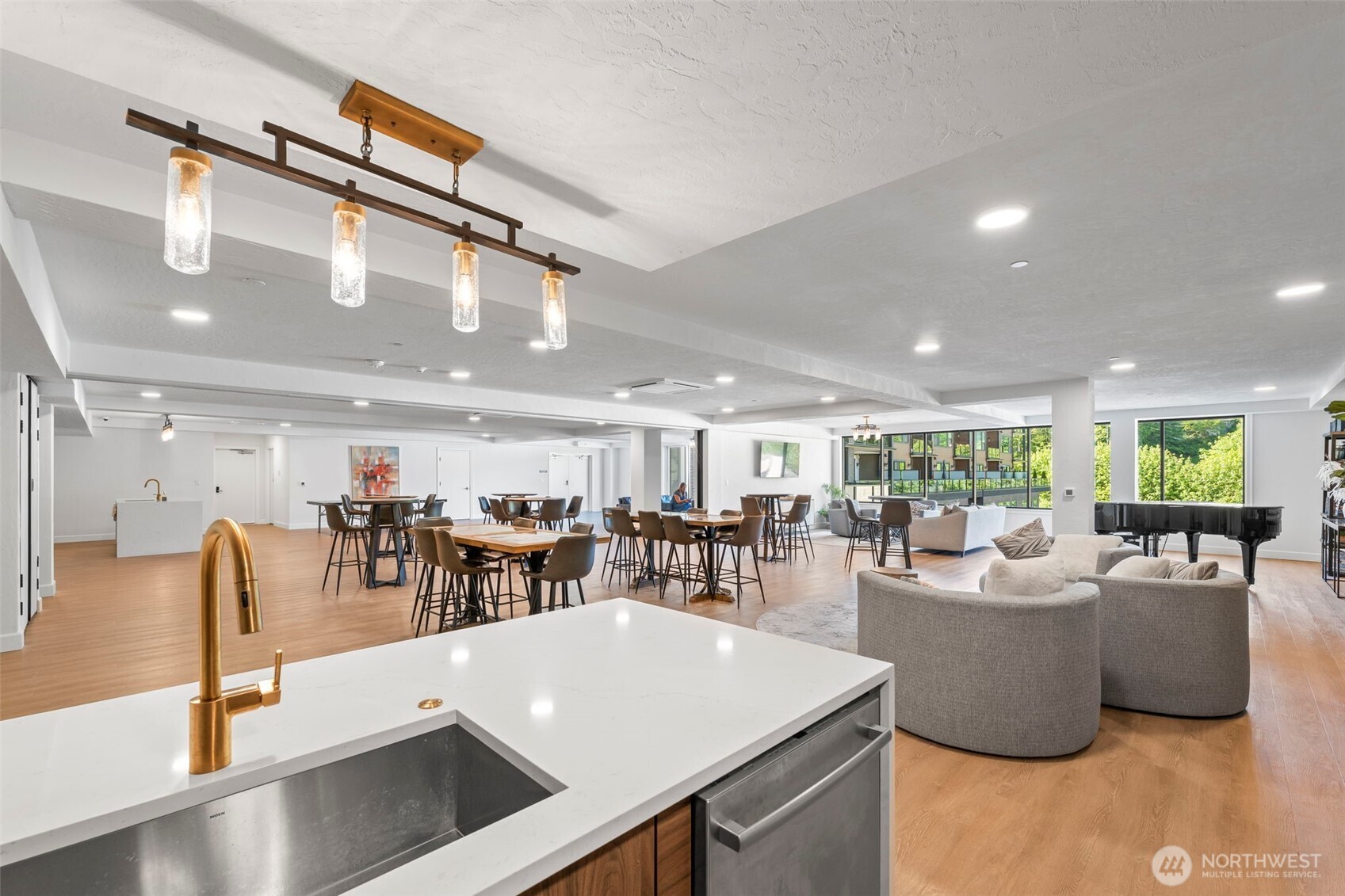 4907 Main Street, Unit 625 Tacoma, WA 98407 - Photo 32 of 40 a view of a dining room with furniture and a large window
