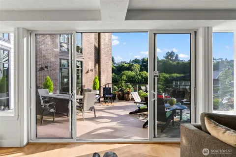 a view of a living room and dining room