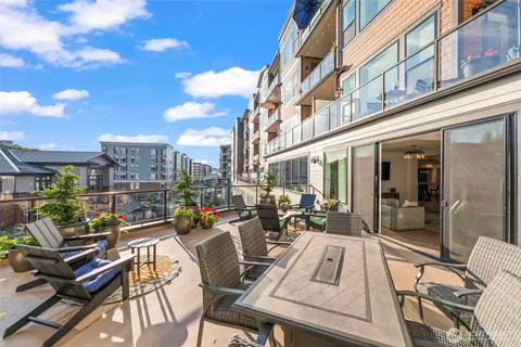 a view of a building with sitting area