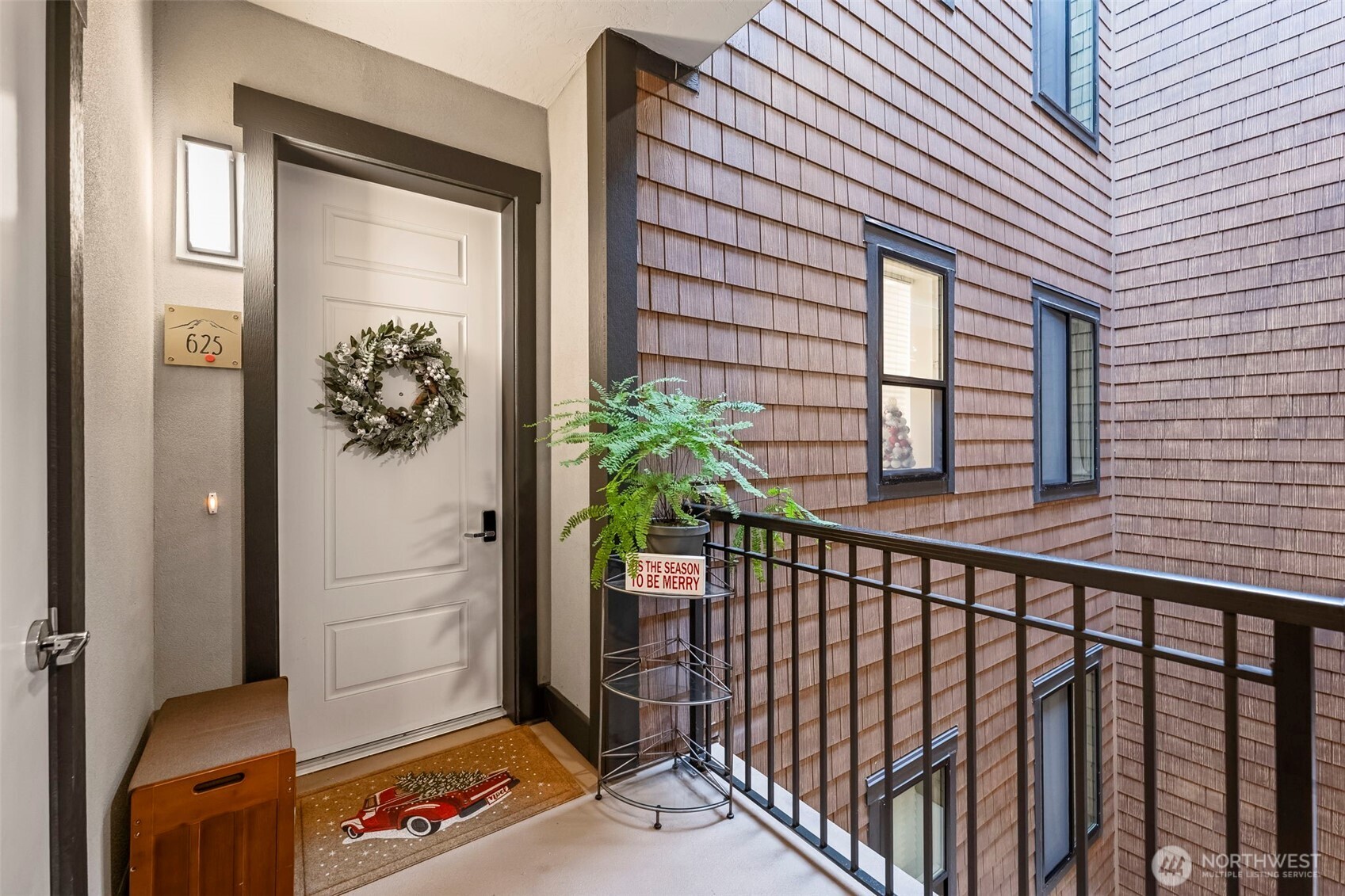4907 Main Street, Unit 625 Tacoma, WA 98407 - Photo 5 of 40 a view of a house with a street