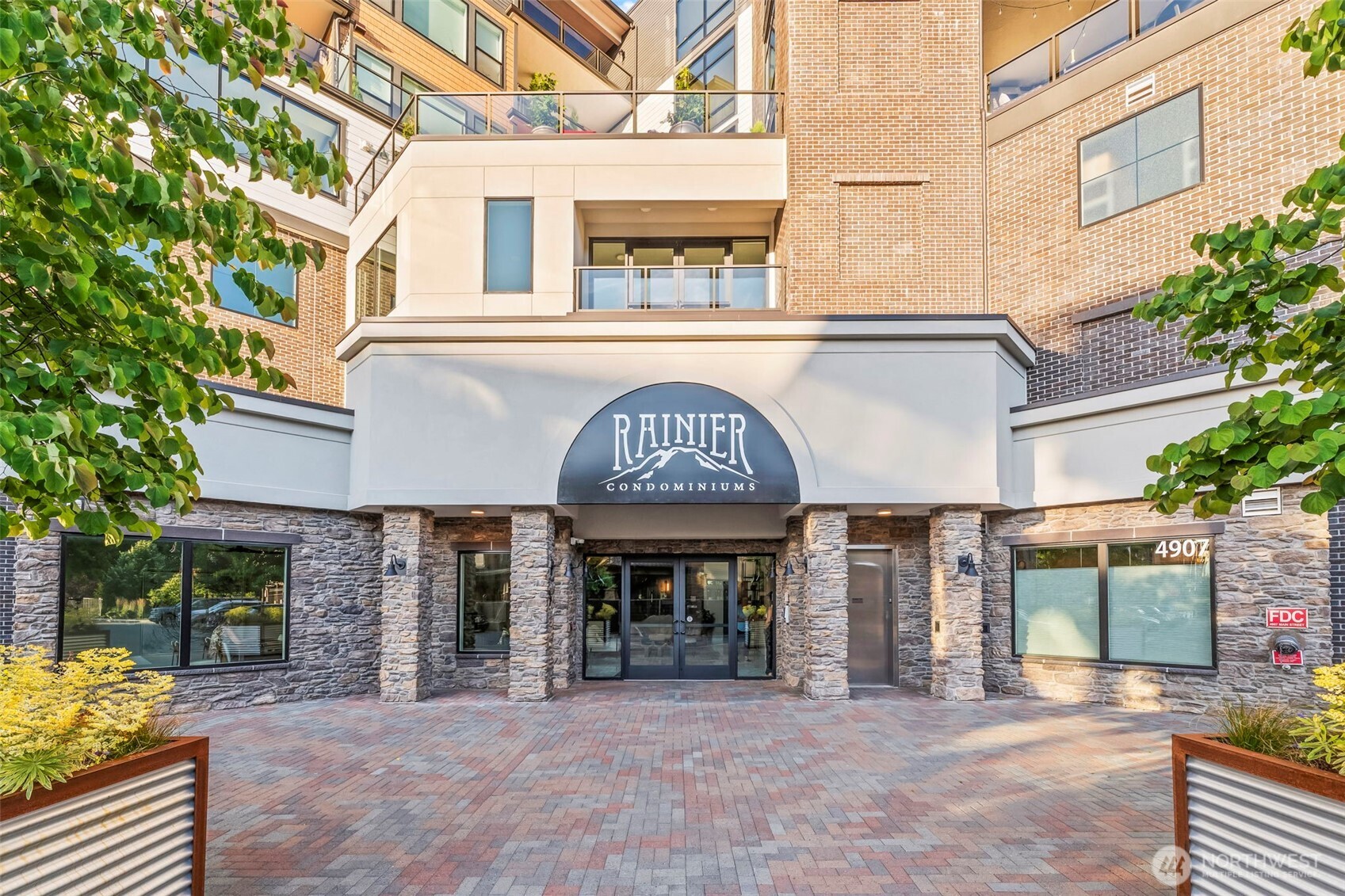 4907 Main Street, Unit 625 Tacoma, WA 98407 - Photo 6 of 6 a view of a building with a porch