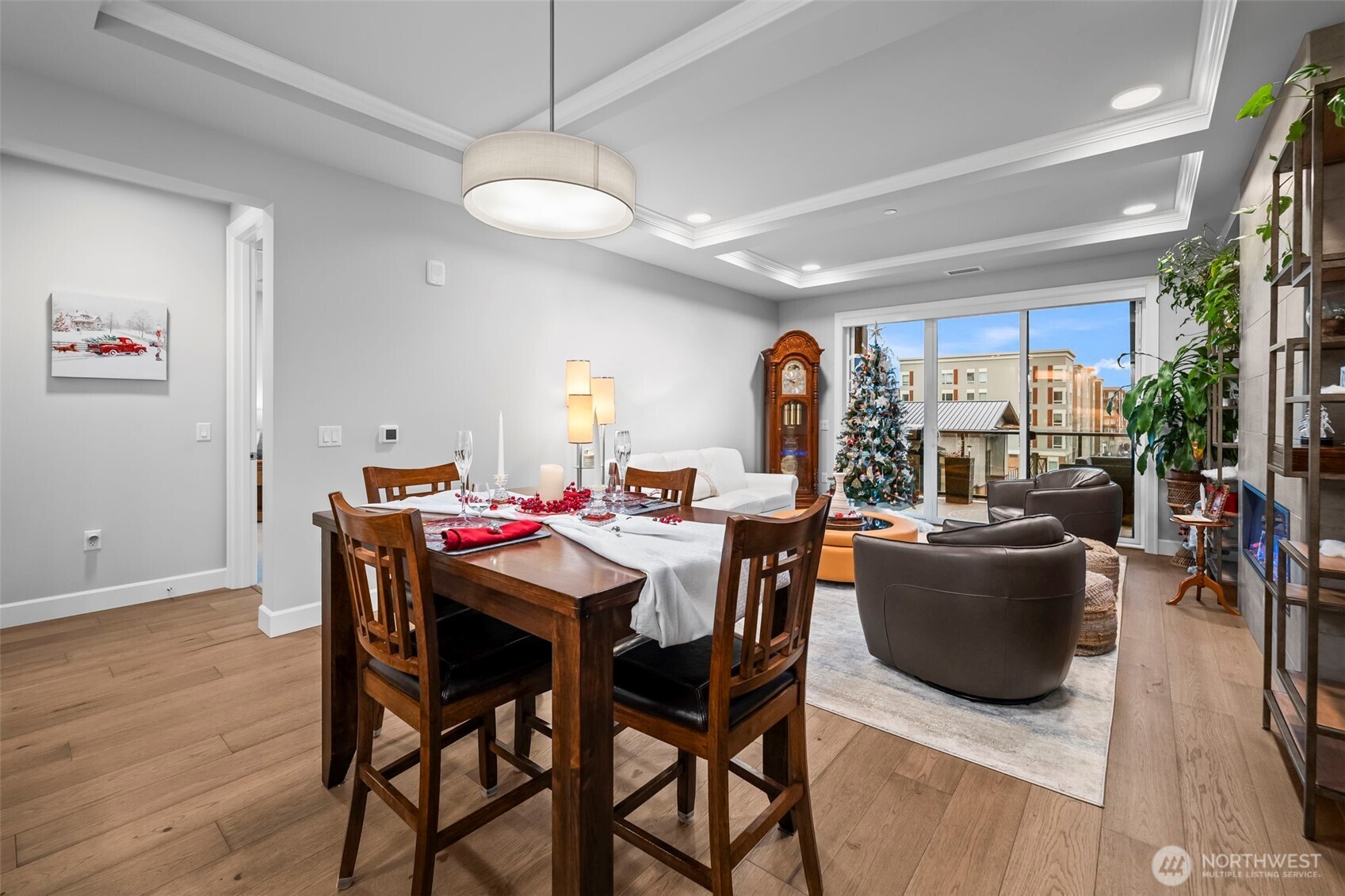 4907 Main Street, Unit 625 Tacoma, WA 98407 - Photo 10 of 40 a view of a dining room with furniture window and wooden floor