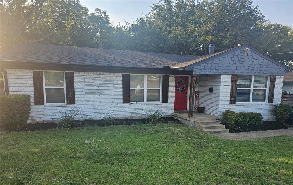 9911 Ferguson Road Dallas, TX 75228 - Photo 1 of 18 Ranch-style house with brick siding, a front yard, and a shingled roof