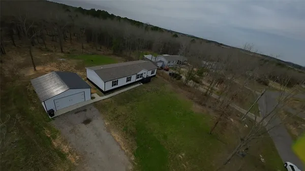 a view of a yard with patio