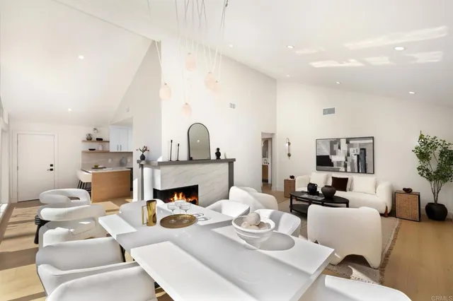 a living room with furniture fireplace and a fireplace