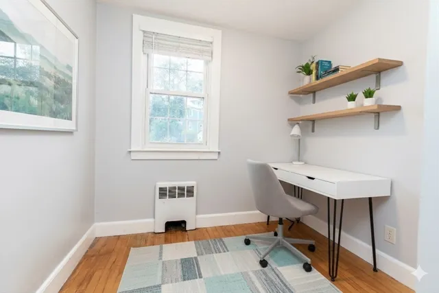 a room with furniture and window