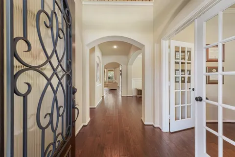 a view of entryway with wooden floor