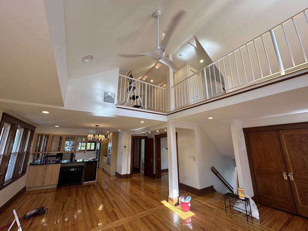 17 Herbert Road, Unit 1 Arlington, MA 02474 - Photo 12 of 26 a view of a living room with furniture and a ceiling fan