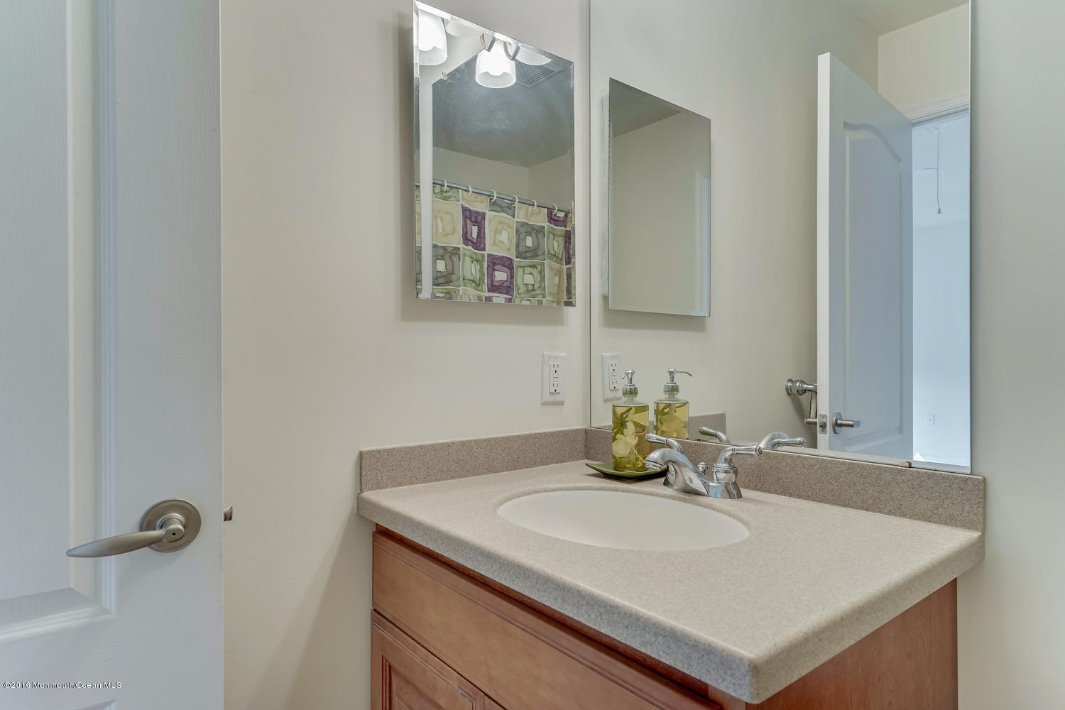 391 South Cooks Bridge Road Jackson, NJ 08527 - Photo 34 of 49 a bathroom with a sink and a mirror