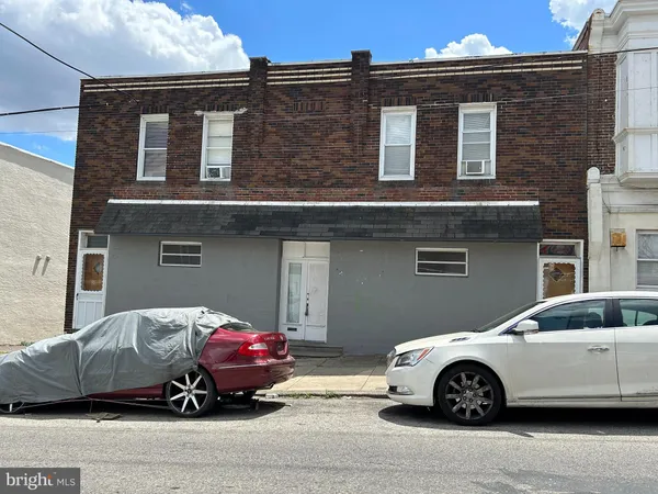 a car parked in front of a house