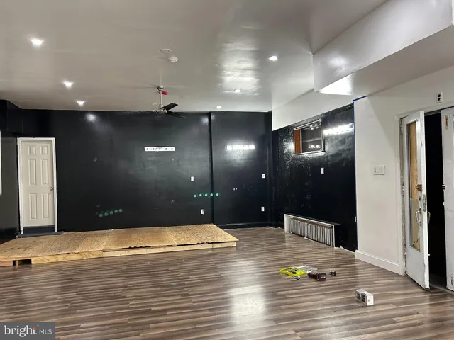 a white toilet sitting next to a bathroom sink