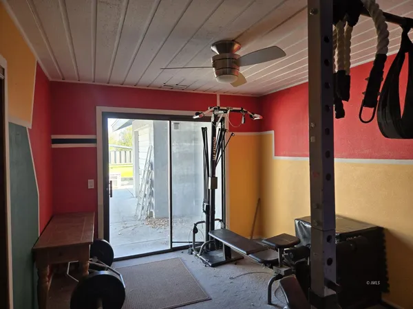 a view of a room with gym equipment