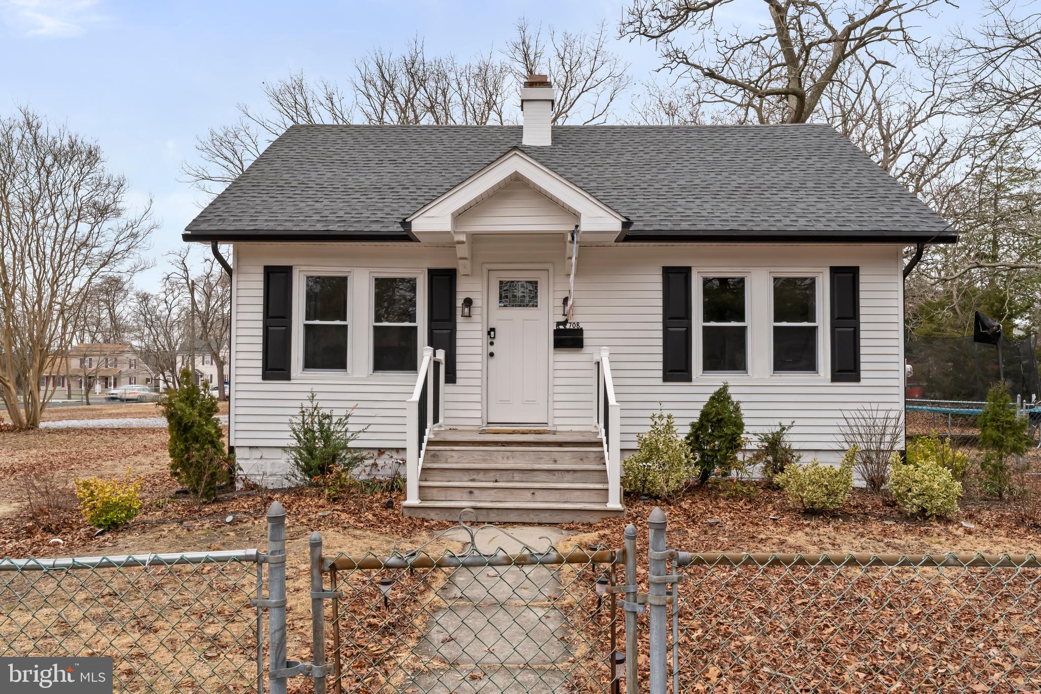 708 South 3rd Street Millville, NJ 08332 - Photo 22 of 33 a front view of a house with a yard