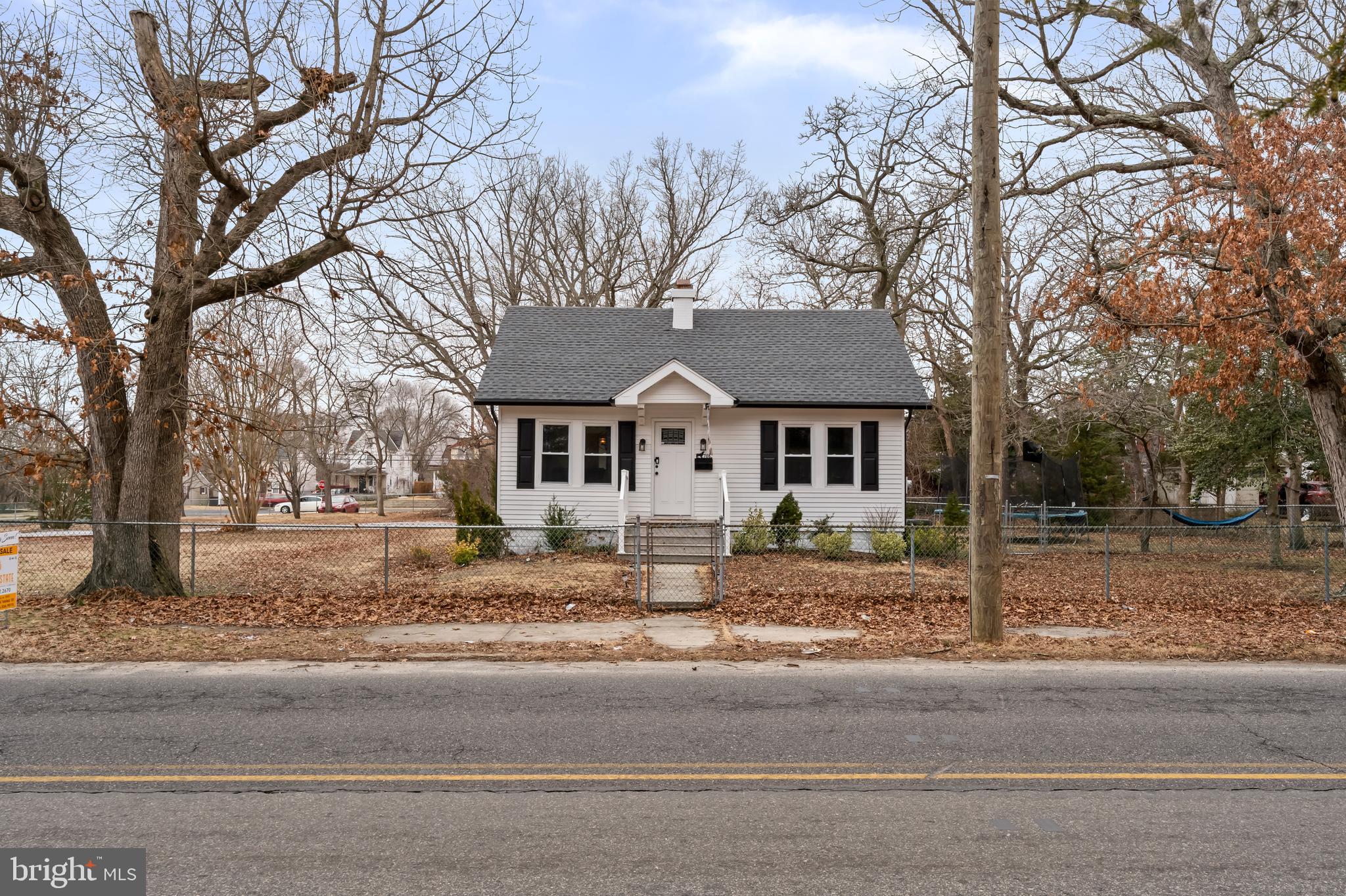 708 South 3rd Street Millville, NJ 08332 - Photo 25 of 33 a view of a house with a yard and large tree