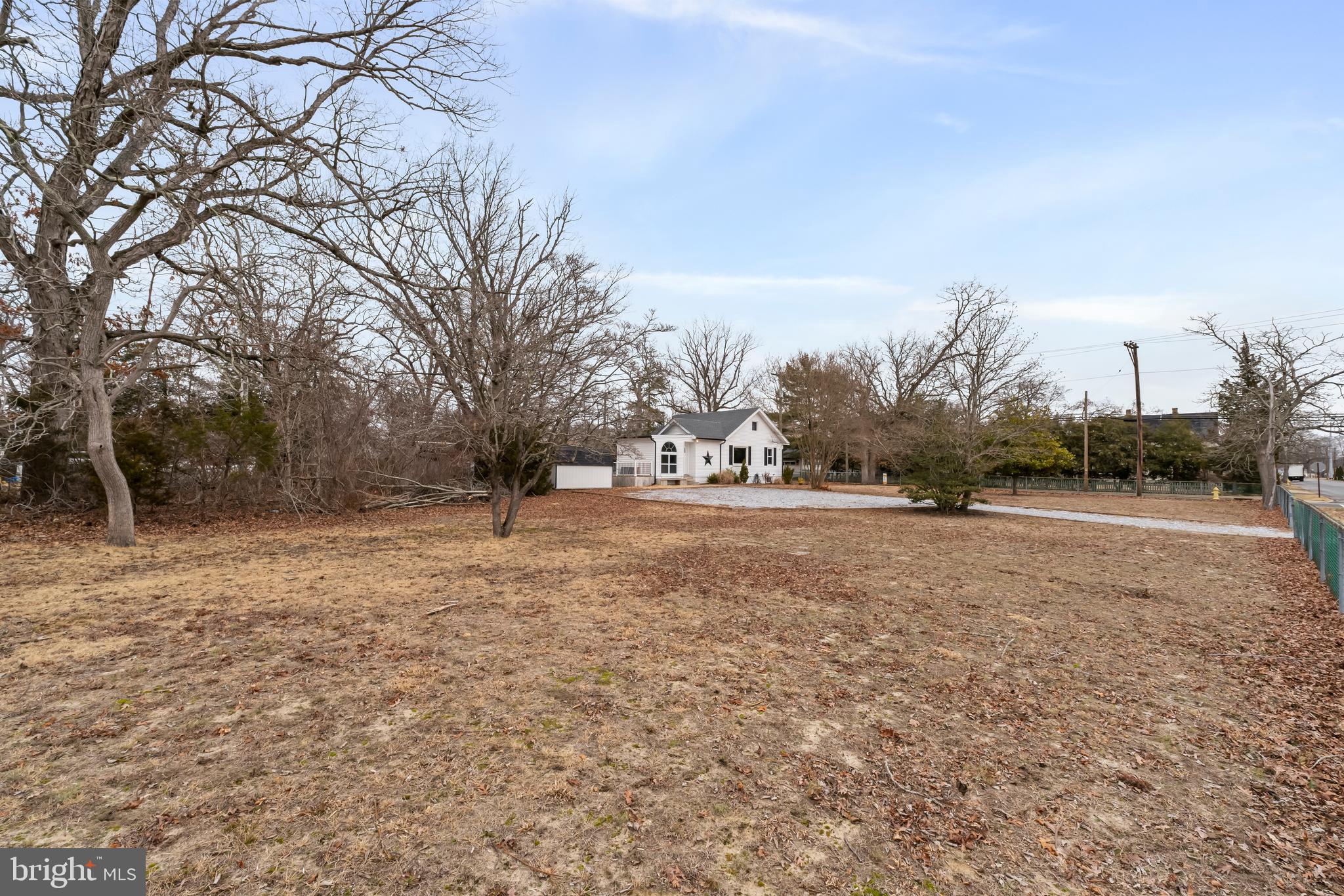 708 South 3rd Street Millville, NJ 08332 - Photo 28 of 33 a view of dirt field with trees