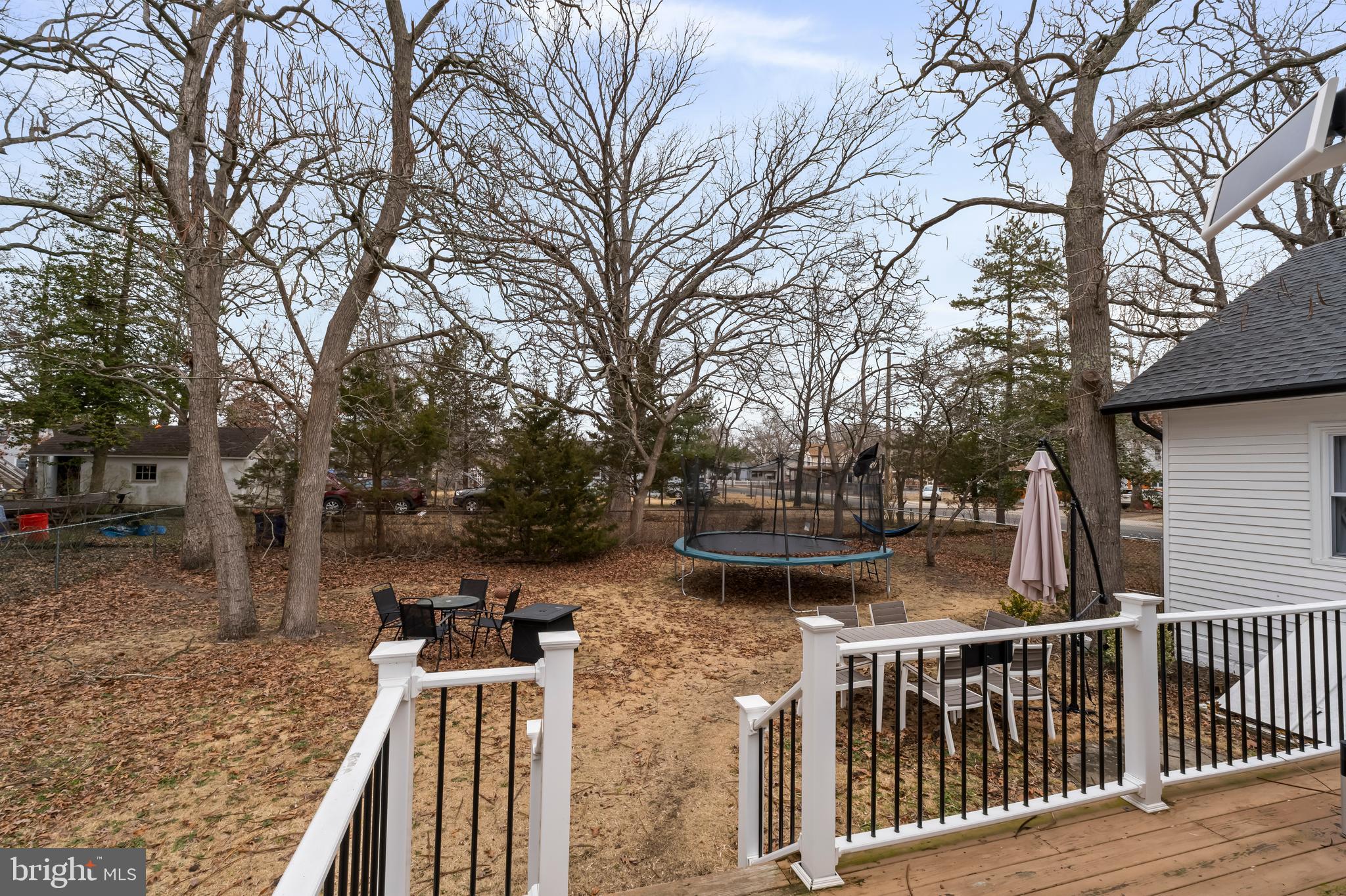 708 South 3rd Street Millville, NJ 08332 - Photo 32 of 33 a view of house with backyard and trees
