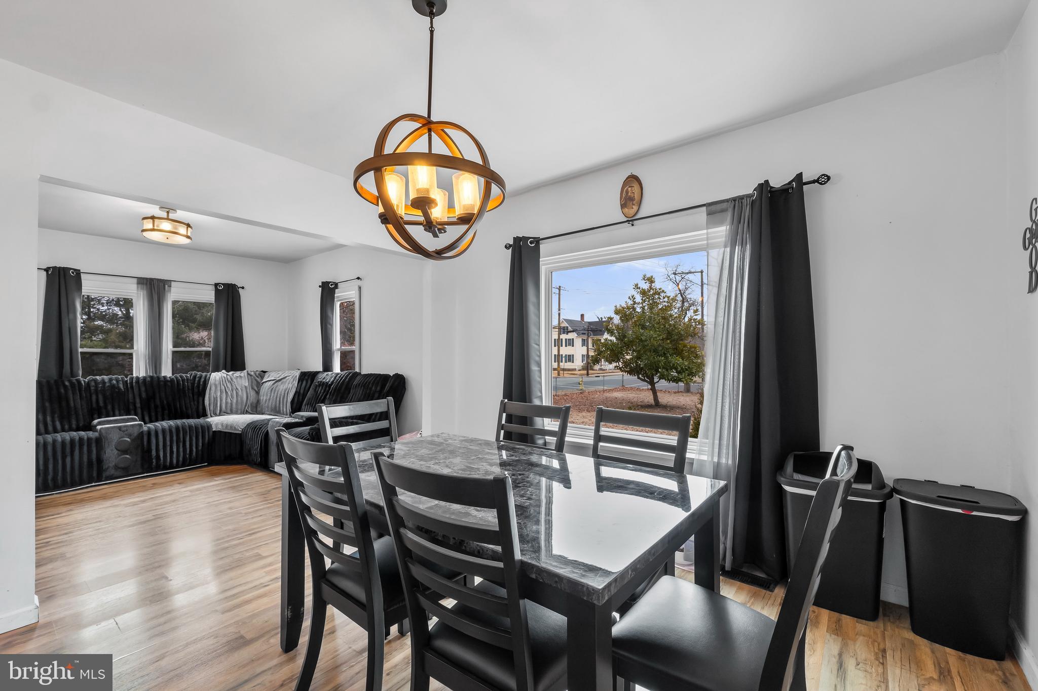 708 South 3rd Street Millville, NJ 08332 - Photo 5 of 33 a view of a dining room with furniture window and outside view