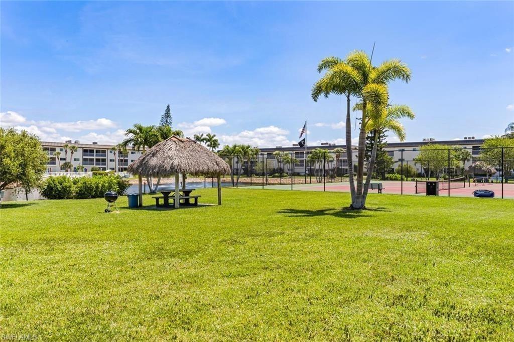 1018 Manatee Road, Unit E302 Naples, FL 34114 - Photo 18 of 19 Surrounding community with a gazebo