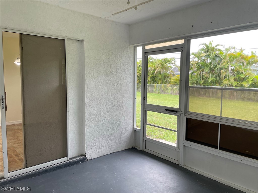 5727 Rose Garden Road, Unit B Cape Coral, FL 33914 - Photo 22 of 26 an empty room with a window