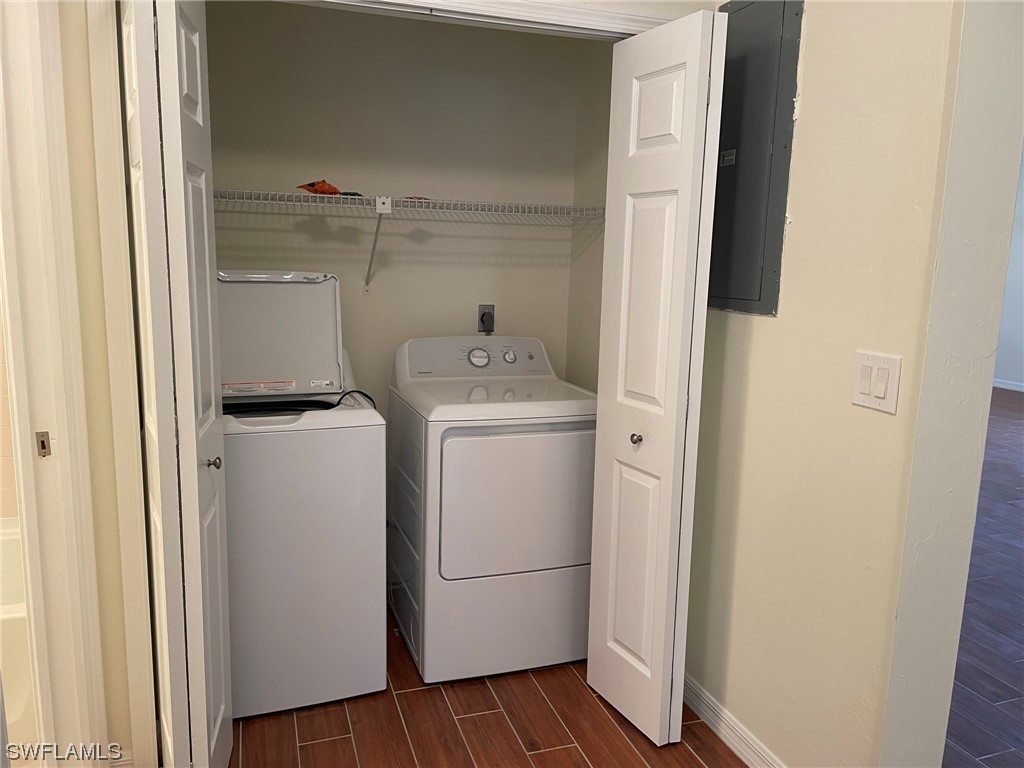 5727 Rose Garden Road, Unit B Cape Coral, FL 33914 - Photo 8 of 26 a utility room with dryer and washer