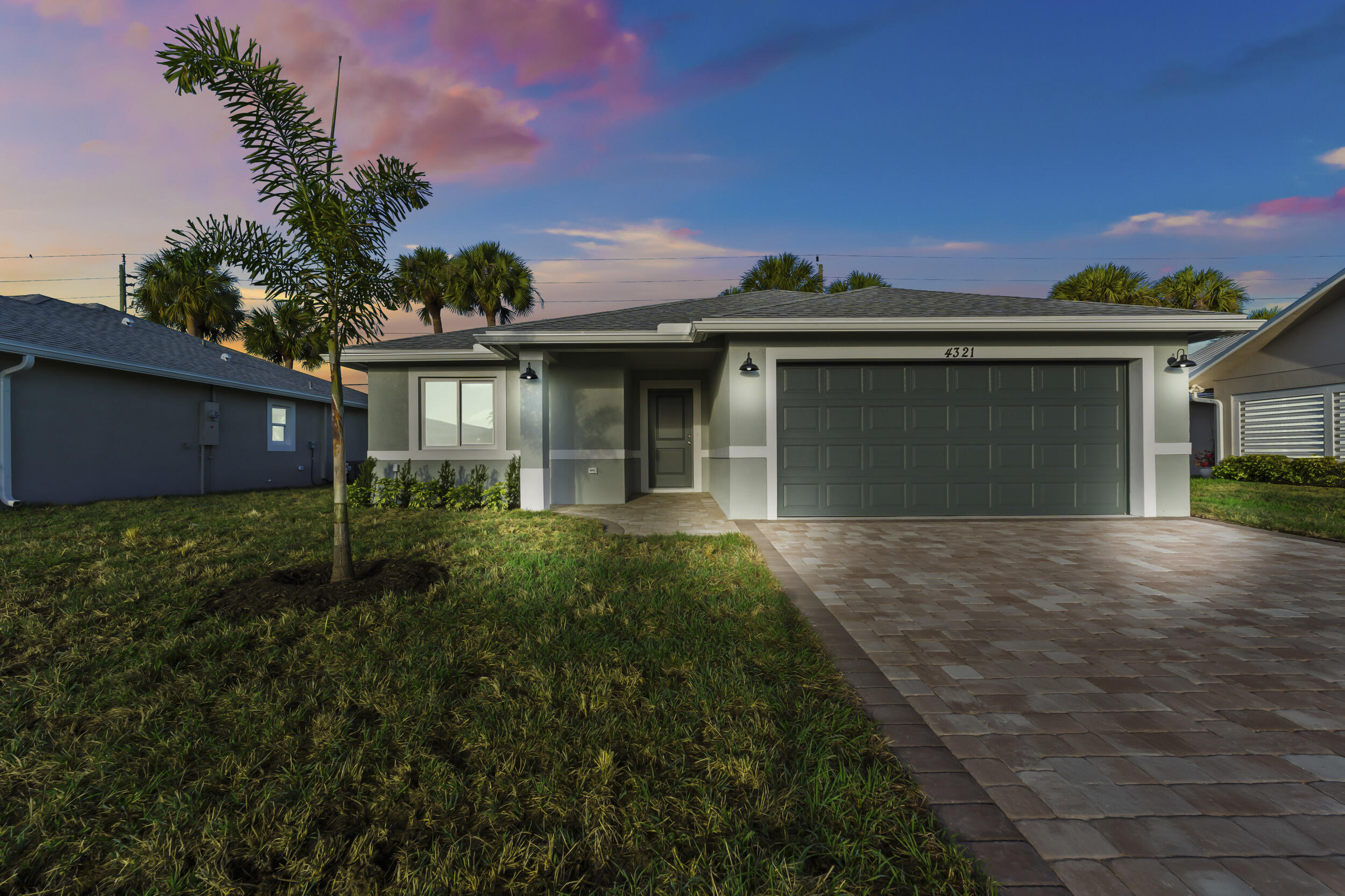 4321 Southwest 15th Way Okeechobee, FL 34974 - Photo 1 of 34 a house view with a garden space