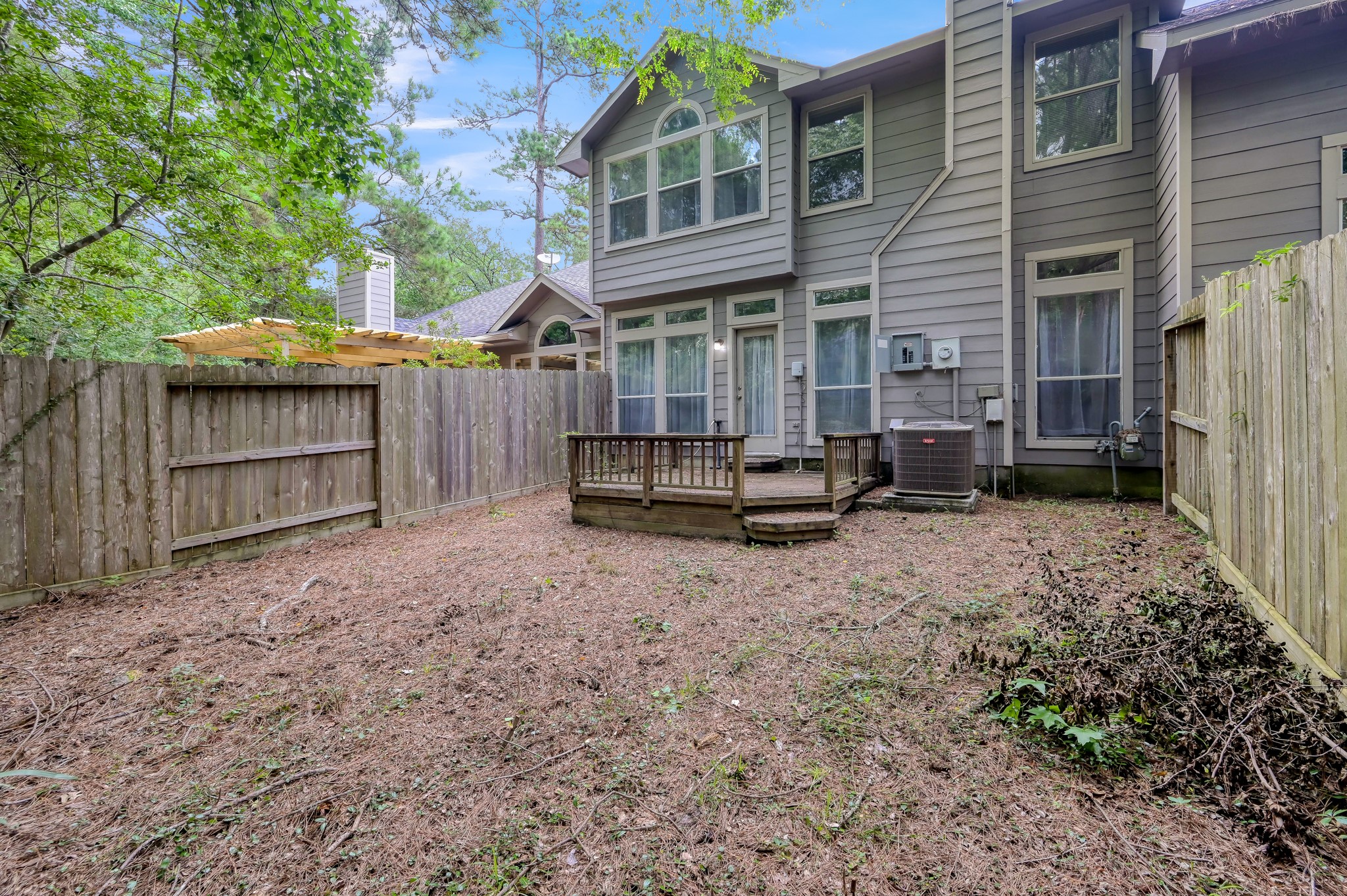 23 Alderon Woods Place Spring, TX 77382 - Photo 5 of 25 a view of a house with a yard and sitting area