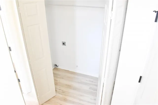 a bathroom with a sink and shower