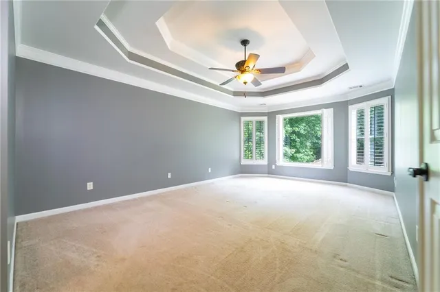 a view of a room with rack on the wall and a window