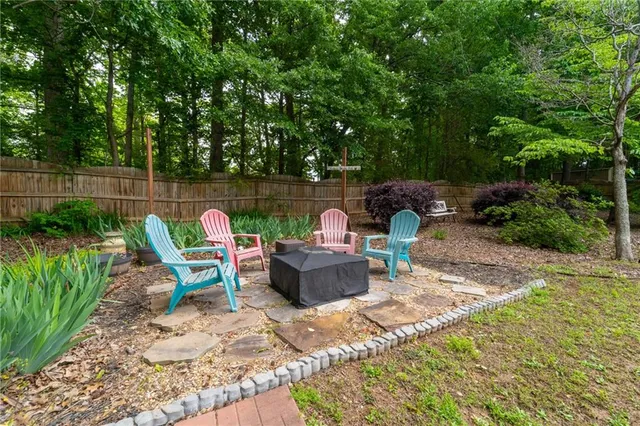 a view of balcony with deck and wooden floor