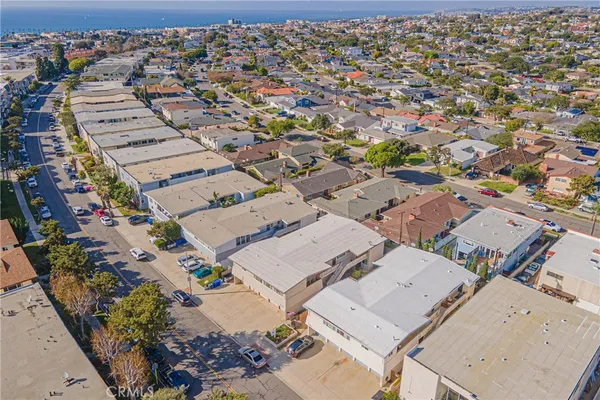 an aerial view of a city with lots of residential buildings