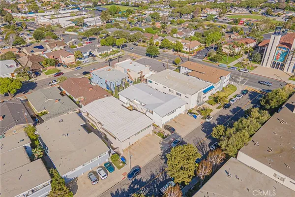 an aerial view of residential building with parking space