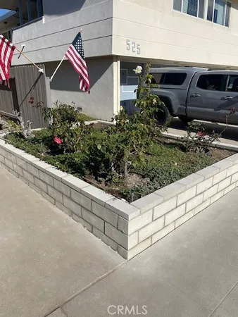 a kitchen with stainless steel appliances granite countertop a sink stove and white cabinets