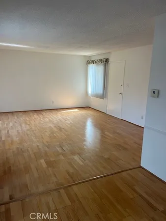 a kitchen with stainless steel appliances a refrigerator sink and stove